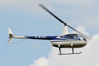 G-BYKK @ EGBT - being used for ferrying race fans to the British F1 Grand Prix at Silverstone - by Chris Hall