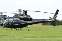 G-BYZA @ EGBT - being used for ferrying race fans to the British F1 Grand Prix at Silverstone - by Chris Hall