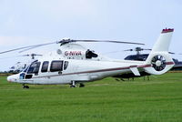 G-NIVA @ EGBT - being used for ferrying race fans to the British F1 Grand Prix at Silverstone - by Chris Hall