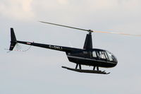 G-OHLI @ EGBT - being used for ferrying race fans to the British F1 Grand Prix at Silverstone - by Chris Hall