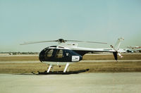N8661F @ HOU - Hughes 500 of Horizon Helicopters as seen at Houston Hobby Airport in October 1979. - by Peter Nicholson