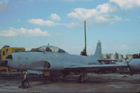 N64274 - T-33A Shooting Star ex 57-0569 in use at the George T. Baker Aviation School in Miami in November 1979. - by Peter Nicholson