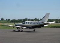N275CA @ KSTC - Socata TBM-700 on the ramp.