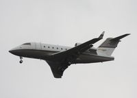 C-FHGC @ TPA - Challenger 604 belonging to the owner of Tim Horton's - by Florida Metal