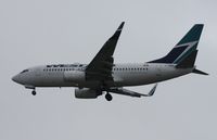 C-FWBG @ TPA - West Jet 737 - by Florida Metal