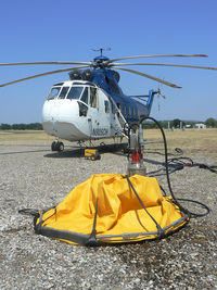 N905CH @ MWL - Type 1 firefighting helicopter with water bucket at Mineral Wells, TX