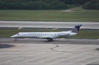 N13936 @ TPA - Express Jet E145 - by Florida Metal