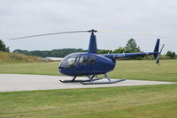 G-INDX @ EGTB - Robinson R44 Clipper II at Wycombe Air Park - by moxy