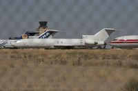 N902PG @ ROW - Taken at Roswell International Air Centre Storage Facility, New Mexico in March 2011 whilst on an Aeroprint Aviation tour - by Steve Staunton