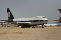 UNKNOWN @ ROW - Taken at Roswell International Air Centre Storage Facility, New Mexico in March 2011 whilst on an Aeroprint Aviation tour, an un-known Boeing 747 hiding in amongst the other aircraft - by Steve Staunton