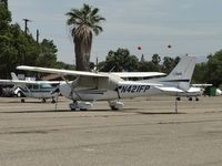 N421FP @ AJO - Sky Hawk tied down and covered up - by Helicopterfriend