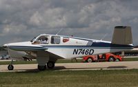 N746D @ KOSH - Beech C35 - by Mark Pasqualino