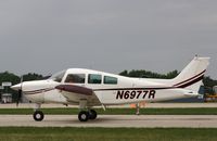 N6977R @ KOSH - Beech C23 - by Mark Pasqualino