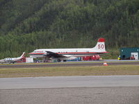 C-GKUG - At Dawson City YT - by Monty Young