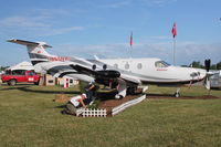 N265NX @ OSH - Pilatus Aircraft Ltd PC-12/47E, c/n: 1265 - static display at 2011 Oshkosh