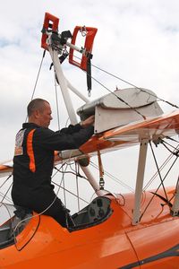 SE-BOG @ X5FB - Pilot David Barrell re-assembles the long range tank prior to the return journey South following a wing walking appearance at the Sunderland Airshow; Fishburn Airfield, July 2011. - by Malcolm Clarke