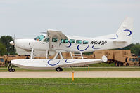 N6143P @ OSH - Cessna 208, c/n: 20800514 arriving at 2011 Oshkosh - by Terry Fletcher