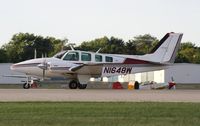 N1648W @ KOSH - Beech 58