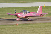 N828J @ KOSH - Taxing to parking from 18R. - by rocapps
