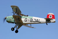 G-BJAL @ EGBR - Another airfield resident Casa 1-131E Srs 1000 Jungmann 'flies by' at Breighton Airfield's Wings & Wheels Weekend, July 2011. - by Malcolm Clarke