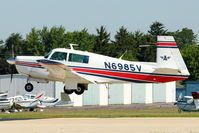 N6985V @ OSH - 1976 Mooney M20F, c/n: 22-1347 arriving at 2011 Oshkosh - by Terry Fletcher