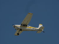 N7819K @ KOSH - leaving Oshkosh EAA 2011 - by steveowen