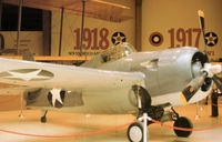 86690 @ NPA - FM-2 Wildcat as displayed in the Pensacola Naval Aviation Museum in November 1979. - by Peter Nicholson