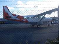 ZK-TZR @ NZWN - On apron at Wellington with its two sister aircraft close by. - by magnaman