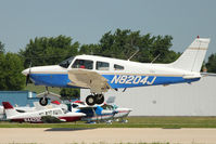 N8204J @ OSH - 1982 Piper PA-28-161, c/n: 28-8216154 at 2011 Oshkosh