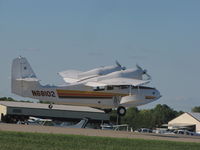 N68102 @ KOSH - landing @KOSH during EAA2011 - by steveowen
