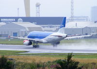 G-DBCF @ EGAC - BMI A319 departing from a wet runway at Belfast City Airport - by Chris Hall