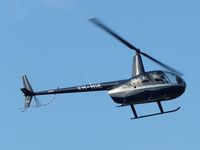 VH-HIE @ YMMB - Robinson R44 VH-HIE approaching the helipad at Moorabbin