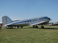 N28AA @ KOSH - polished and shinning in the Oshkosh sun - by steveowen