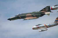 72-1490 @ KNTU - MDD F-4E in formation with two very shiny F-86s. - by Gregg Stansbery