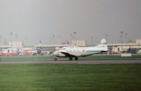 G-ATAI @ LHR - Dove 8 of Centrax Limited taxying at Heathrow in November 1974. - by Peter Nicholson