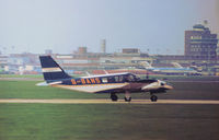 G-BANS @ LHR - PA-34 Seneca 200-2 taxying at Heathrow in November 1974. - by Peter Nicholson