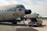 59-0536 @ DOV - 1959 Douglas C-133B-DL Cargomaster and a Ford Falcon at the Air Mobility Command Museum, Dover AFB, DE - by scotch-canadian