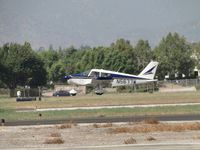 N5677W @ POC - Landing on runway 26L - by Helicopterfriend