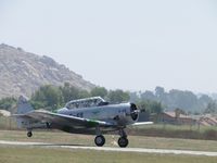 N7300C @ RIR - Touching down, tail wheel still up