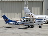 N881HP @ ONT - After code 7 or a break, Officer is checking fuel prior to departing - by Helicopterfriend