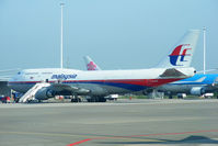 9M-MPH @ EHAM - Malaysia Airlines - by Chris Hall