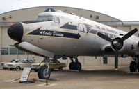 44-9030 @ DOV - 1944 Douglas C-54M Skymaster and Ford Falcons at the Air Mobility Command Museum, Dover AFB, DE - by scotch-canadian