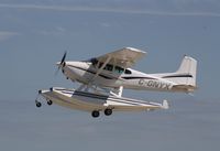 C-GNYX @ KOSH - Cessna A185F - by Mark Pasqualino
