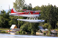 N777T @ LHD - N777T Beaver airborne at Lake Hood, Anchorage AK - by Pete Hughes