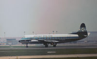 G-BAPD @ LHR - Viscount 814 of British Midland Airways preparing for take-off on Runway 27L at Heathrow in November 1974. - by Peter Nicholson