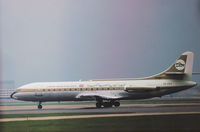 5A-DAA @ LHR - Caravelle VI-R of Libyan Arab Airlines preparing for take-off on Runway 27L at Heathrow in November 1974. - by Peter Nicholson