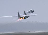 82-0034 @ KPAM - F-15C Demo Team aircraft takes off just after a rain storm during the airshow. - by Gregg Stansbery