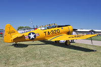 N4996H @ OSH - 1951 North American T-6G, ex USAF 49-3320A
C/N 168-424 at 2011 Oshkosh - by Terry Fletcher