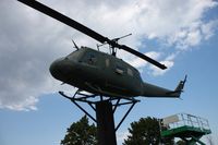 66-0796 - UH-1H on a post outside VFW hall in Fraser MI - by Florida Metal