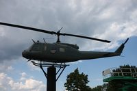 66-0796 - UH-1H on a post outside VFW Hall Fraser MI - by Florida Metal